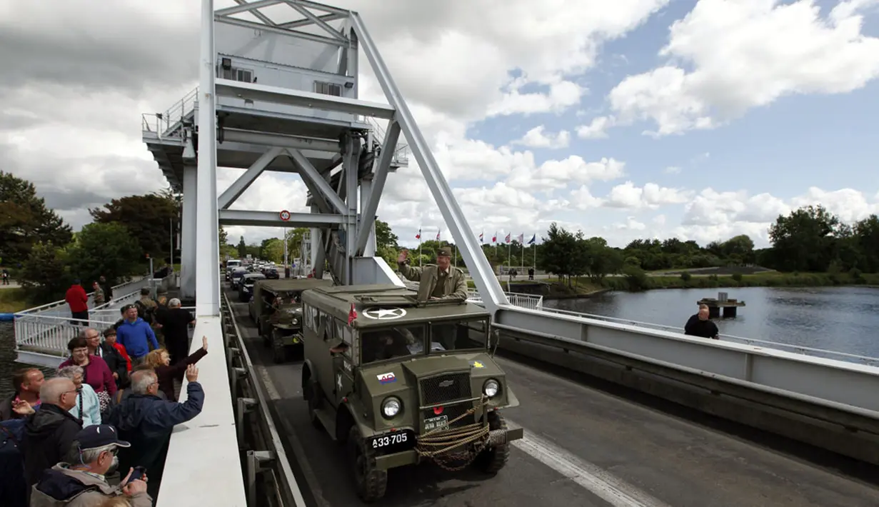 Para veteran perang D-Day mulai berdatangan di Normandia, Perancis, (4/6/2014). Mereka akan ikut memperingati aksi invasi terbesar yang dikenal dengan sebutan "The Longest Day", atau "hari terpanjang". (REUTERS/Chris Helgren)