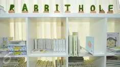 Buku-buku dongeng Rabbit Hole tertata rapi di rak ruang perpustakaan Rabbit Hole di kawasan Kemang, Jakarta Selatan, Selasa (11/10). Rabbit Hole adalah layanan penyedia jasa pembuatan buku dongeng dengan ilustrasi menarik. (Liputan6.com/Yoppy Renato)