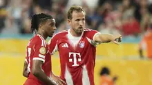 Harry Kane (kanan) dari Bayern&nbsp;Munchen memberikan isyarat saat berbicara dengan rekan setimnya, Michael Olise, dalam pertandingan Grup C Piala Dunia Antarklub antara Bayern&nbsp;Munchen dan Boca Juniors di Miami Gardens, Florida, Jumat, 20 Juni 2025. (AP Photo/Lynne Sladky)