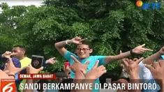 Usai senam, Sandi mendatangi Pasar Bintoro dan berdialog dengan para pedagang.