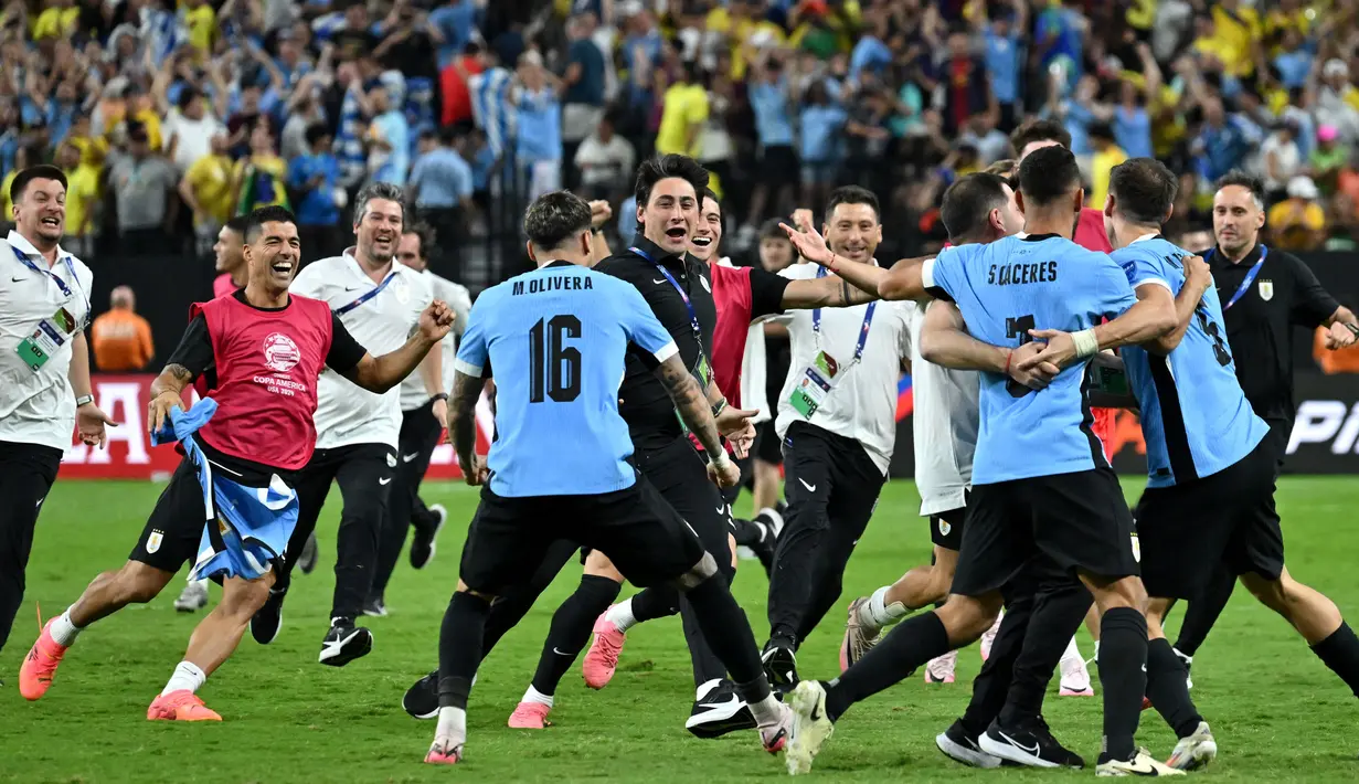 Di babak adu penalti, Uruguay unggul 4-2 atas Brasil. Kemenangan ini mengantar La Celeste melaju ke semifinal Copa America 2024. (Robyn Beck/AFP)