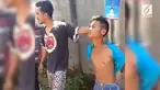 Seorang remaja yang diduga mencuri ayam siang hari kena amuk massa.