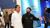 Menteri BUMN Erick Thohir mendampingi Presiden Jokowi dalam acara pembukaan BUMN Startup Day 2022 di ICE BSD, Kabupaten Tangerang, Banten, Senin (26/9/2022).