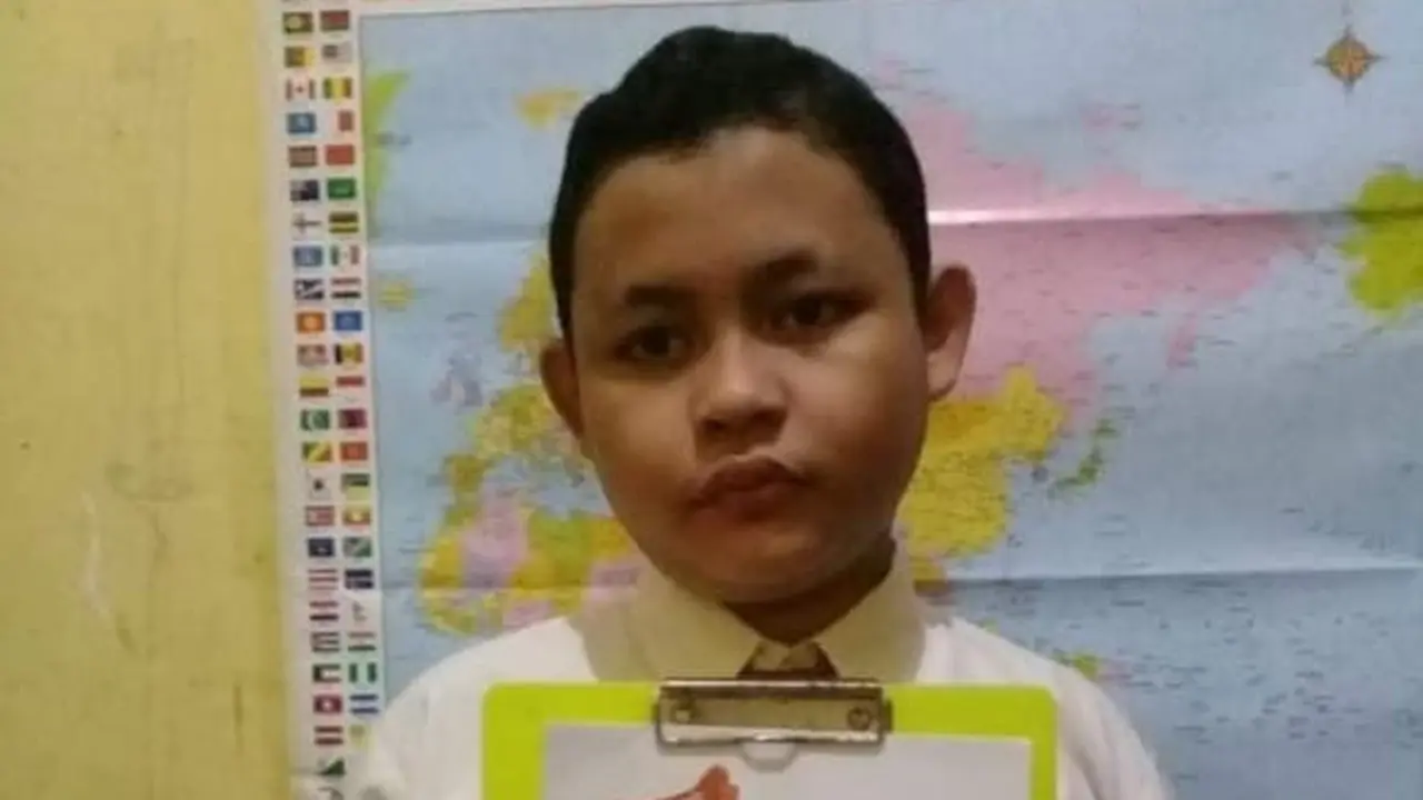 Aqil (12) penyandang autisme.