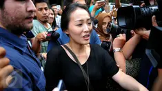 Made Sandy Salihin, saudara kembar dari Mirna saat tiba di Gedung Direktorat Reserse Kriminal Umum Polda Metro Jaya, Rabu (3/2/2016). Polisi memanggil Sandy untuk dimintai keterangan sebagai saksi. (Liputan6.com/Faisal R Syam)