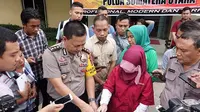 Pihak USU menilai dosen yang terjerat kasus ujaran kebencian akibat komentarnya terkait bom gereja di Surabaya, belum tentu bersalah. (Liputan6.com/Reza Efendi)