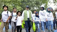 Ketua Umum Partai Kebangkitan Bangsa (PKB) Abdul Muhaimin Iskandar bersama DPP Perempuan Bangsa mengajak 1000 anak Yatim Piatu dari sejumlah daerah di Jabodetabek berwisata ke Taman Impian Jaya Ancol, Jakarta, Sabtu (29/7). (Dok. Istimewa)
