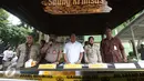 Kabid Humas Polda Metro Jaya, Kombes Argo Juwono memberi keterangan saat merilis perdagangan ilegal bibit lobster di Polda Metro Jaya, Jakarta, Jumat (23/12). (Liputan6.com/Gempur M. Surya)