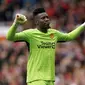 Selebrasi Andre Onana saat Manchester United (MU) menghadapi RC Lens pada laga uji coba di Old Trafford, Sabtu (5/8/2023) malam WIB. (Nick Potts/PA via AP)