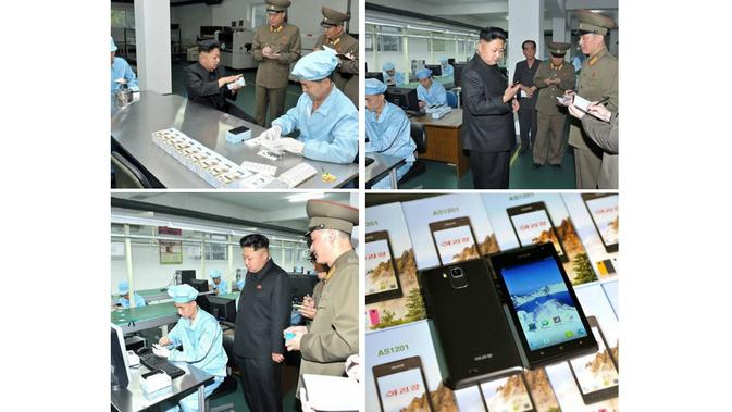 Kim Jong-un saat menilik pabrik smartphone Korea Utara (Sumber: Tech In Asia)