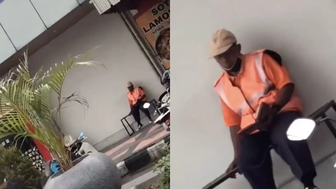 Viral Tukang Parkir Bertugas Sembari Membaca Al-Quran, Bikin Salut Warganet