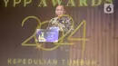 Ketua Umum Yayasan Pundi Amal Peduli Kasih, Komjen Pol (Purn) Imam Sudjarwo memberikan sambutan jelang pemberian YPP Award 2024 di Jakarta, Jumat (15/11/2024). (Liputan6.com/Helmi Fithriansyah)