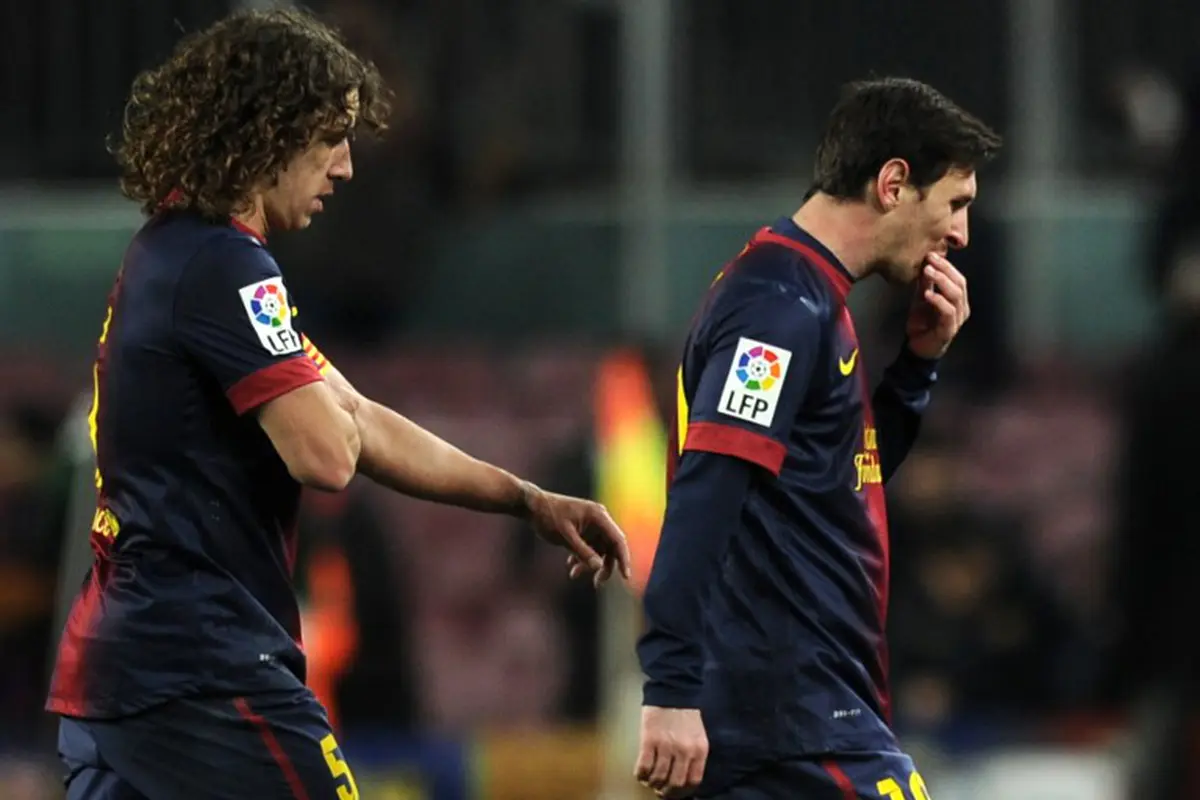 Carles Puyol- Lionel Messi
