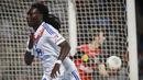 Bafetimbi Gomis berhasil mencatatatkan waktu 8 menit untuk mencetak hat-trick kala Olympique Lyon berpesta 7-1 lawan Dinamo Zagreb di Liga Champions 2010/2011. (AFP/Jeff Pachoud)
