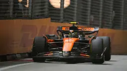 McLaren memastikan diri mereka menyabet gelar ini dengan koleksi 650 poin disusul oleh Mercedes dengan raihan 325 poin. (AP Photo/Vincent Thian)