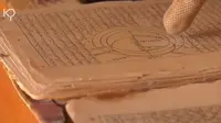 Manuskrip kuno di Syinqith, negeri dengan tradisi menghafal Al-Qur'an terbaik di dunia. (Foto: YT Kabar Pedia)