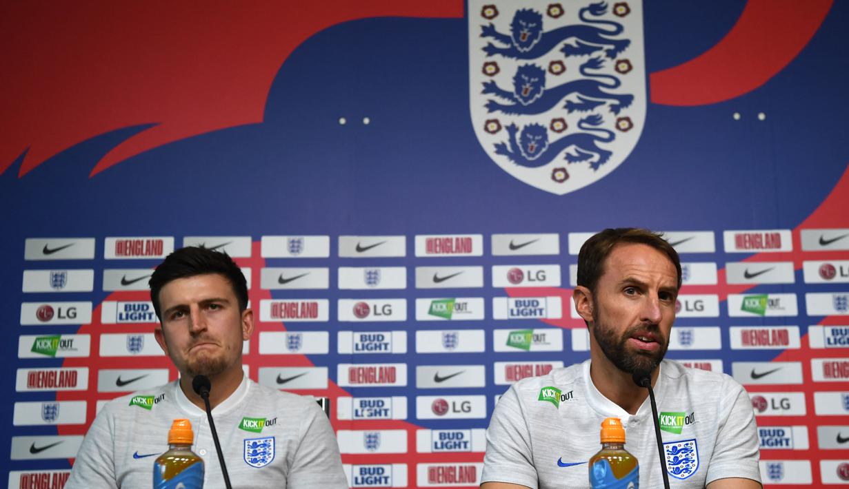 Gareth Southgate selaku pelatih Timnas Inggris telah mengumumkan 26 nama pemain yang akan dibawa ke Piala Dunia 2022 termasuk membuat kejutan membawa pemain Manchester United, Harry Maguire yang jarang tampil dibawah asuhan Erik Ten Hag. (AFP/Paul Ellis)