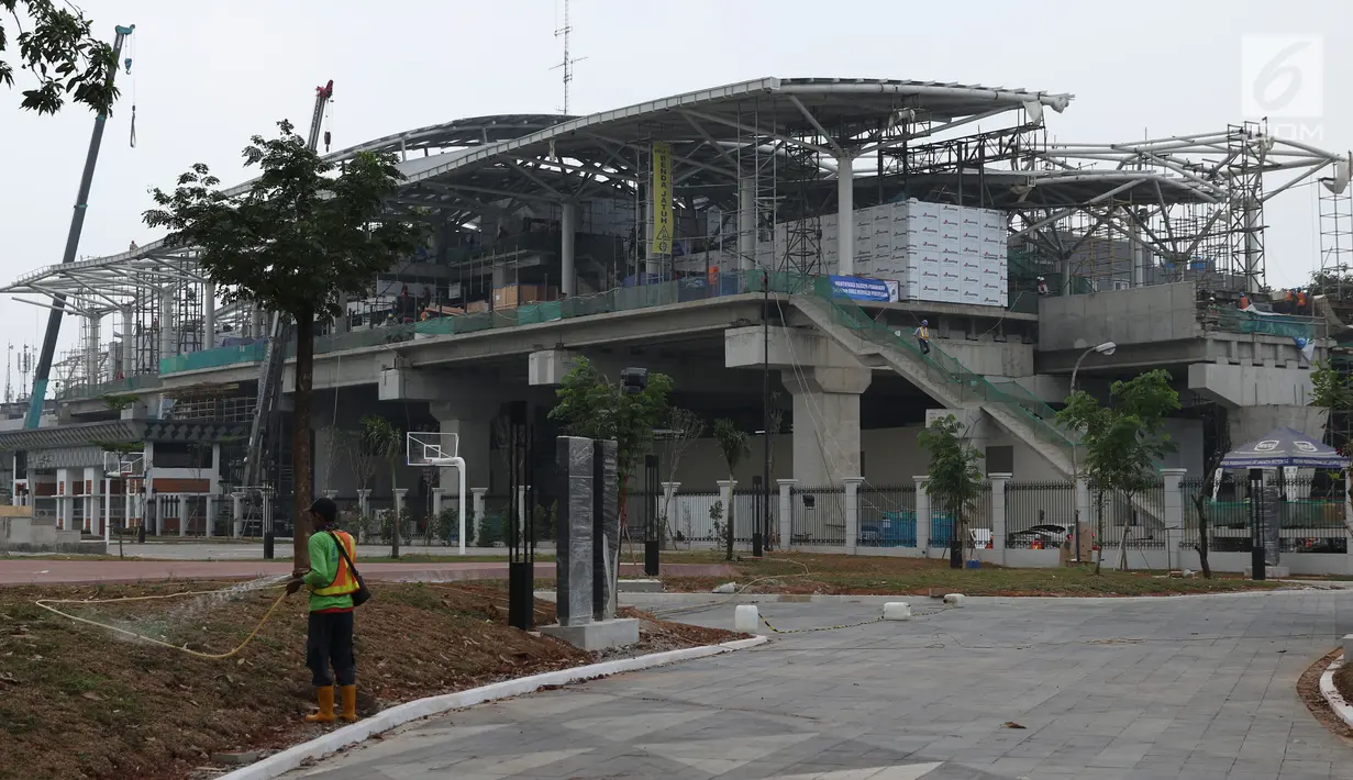 Suasana pembangunan Stasiun kereta LRT Velodrome Rawamangun, Jakarta, Selasa (17/7). LRT fase 1 rute Kelapa Gading-Velodrome Rawamangun sepanjang 5,8 kilometer ditargetkan selesai jelang pelaksanaan Asian Games 2018. (Liputan6.com/Helmi Fithriansyah)