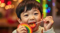 5 Cara Cegah Karang Gigi Anak, Salah Satunya Batasi Makanan Manis. Foto dibuat oleh AI.