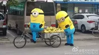 Minions dengan pisang dan sepeda roda tiga. (Mashable)