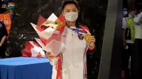 Greysia Polii tiba di Tanah Air usai merebut emas di Olimpiade Tokyo 2020 (Pramita Tristiawati/Liputan6.com)