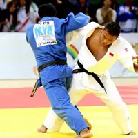 Horas Manurung dan tim judo Indonesia berhasil menjadi juara umum pada SEA Games 2015 di Singapura.