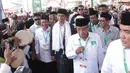 Presiden Joko Widodo menghadiri pembukaan musyawarah nasional dan konferensi besar NU di Banjar, Jawa Barat, Rabu (27/2). Jokowi mengucapkan terima kasihnya atas peran PBNU yang telah berkontribusi dalam merawat keutuhan NKRI. (Liputan6.com/Angga Yuniar)