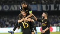 Pemain Real Madrid merayakan gol yang dicetak ke gawang Napoli pada laga Liga Champions di Stadion Diego Armando Maradona, Rabu (4/10/2023). Berkat kemenangan tersebut, Madrid menjaga puncak klasemen Grup C dengan koleksi enam poin dari dua laga. Napoli tetap berada di posisi dua dengan tiga poin. (AP Photo/Alessandra Tarantino)
