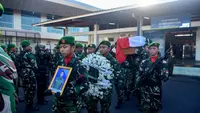Upacara penyambutan dan serah terima jenazah Pratu Afrio bertempat di Terminal Cargo Bandara Internasional Sam Ratulangi Manado, Rabu (14/5/2025).
