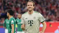 Penyerang Bayern Munich asal Inggris #09, Harry Kane, merayakan gol penalti dalam pertandingan divisi satu Bundesliga Jerman antara Bayern Munich dan Werder Bremen di Munich, Sabtu (27-9-2025) dini hari WIB. (Alexandra BEIER/AFP)