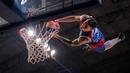 Personel tim atraksi slam dunk akrobatik, Crazy Dunker beraksi saat menghibur penonton IBL All Star 2024 di Britama Arena, Kelapa Gading, Jakarta, Sabtu (27/04/2024). (Bola.com/Bagaskara Lazuardi)