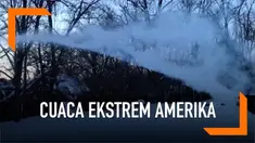 Cuaca ekstrem melanda sebagian wilayah Amerika Serikat. Di beberapa tempat suhu udara bisa mencapai di bawah 20 derajat celcius. Air pun bisa membeku dalam sekejap.
