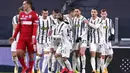 Para pemain Juventus merayakan gol yang dicetak oleh Alvaro Morata ke gawang SPAL pada laga Coppa Italia di Stadion Allianz, Rabu (27/1/2021). Juventus menang dengan skor 4-0. (Fabio Ferrari/LaPresse via AP)