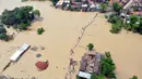 Pemandangan udara dari desa yang terdampak banjir di Distrik Darbhanga, Negara Bagian Bihar, India timur pada 26 Juli 2020. Sedikitnya 10 orang tewas dan hampir 1,5 juta orang terkena dampak akibat banjir di 11 distrik di Bihar, papar Departemen Manajemen Bencana Bihar. (Xinhua/Partha Sarkar)