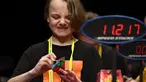 Seorang anak semangat memecahkan permainan rubik pada kejuaraan kubus Rubik Dunia di Melbourne, Australia (12/7/2019). Kejuaraan Dunia diadakan setiap dua tahun dan telah menarik 905 pesaing dari seluruh dunia yang bersaing dalam 18 acara yang berbeda. (AFP Photo/William West)