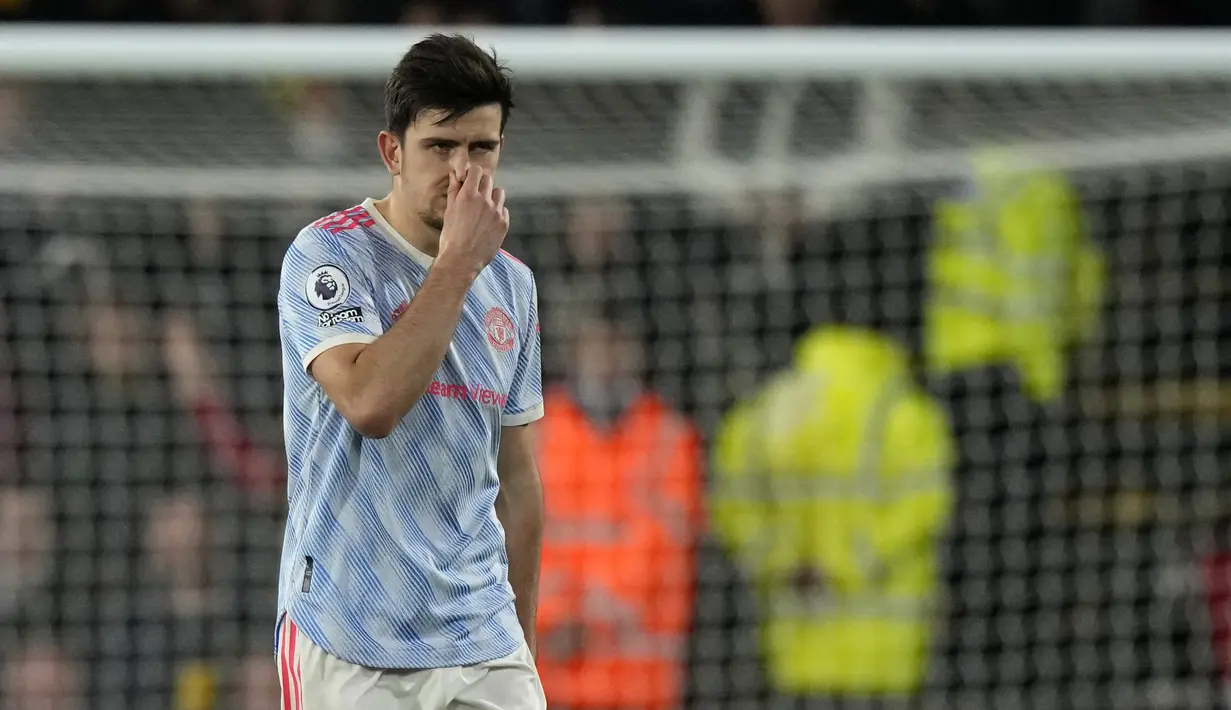 Untuk dua pertandingan liga Inggris selanjutnya, Manchester United harus kehilangan Harry Maguire. Semoga barisan belakang MU tetap solid mengingat dua pertandingan kedepan akan berhadapan dengan Chelsea dan Arsenal. (AP Photo/Frank Augstein)