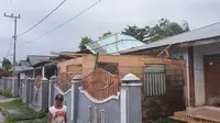 Rumah warga yang rusak akibat angin kencang di Kabupaten Kepulauan Talaud, Provinsi Sulawesi Utara (Sulut). (Liputan6.com/Istimewa)