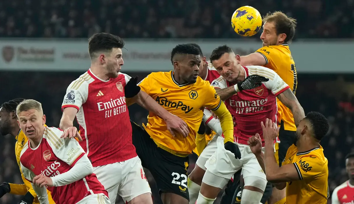 Arsenal harus bekerja keras untuk menumbangkan Wolverhampton Wanderers pada pekan ke-14 Liga Inggris. The Gunners menang 2-1. (AP Photo/Alastair Grant)