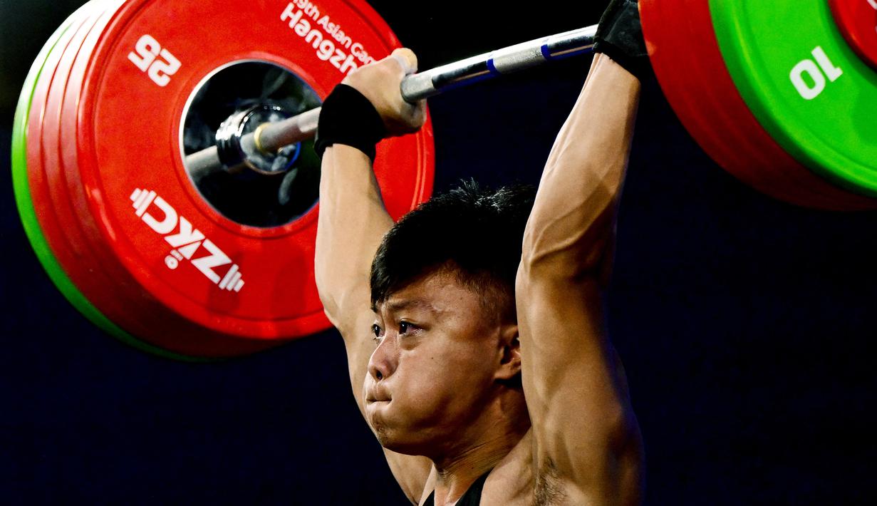 Dengan demikian, dia menorehkan total angkatan 359 kg. (Ishara S.KODIKARA / AFP)