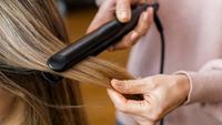 How to Curl Your Hair With a Flat Iron in 7 Easy Steps