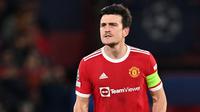 Pemain Manchester United, Harry Maguire melakukan selebrasi setelah mencetak gol kedua timnya ke gawang Atalanta pada laga Grup F Liga Champions 2021/2022 di Old Trafford, Manchester, Inggris, 20 Oktober 2021 waktu setempat. Maguire sukses mencetak gol pada menit ke-75. Gol tersebut membangkitkan semangat Skuad Setan Merah hingga akhirnya Cristiano Ronaldo mengunci kemenangan 3-2 atas Atalanta. (AFP/Paul Ellis)