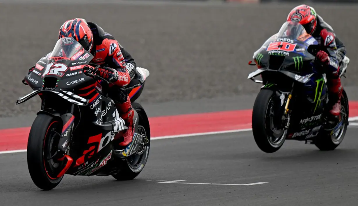 Adapun tempat kedua secara berturut-turut ditempati oleh Maverick Vinales dan Fabio Quartararo yang berselisih 0.306 serta 0.433 detik dari sang juara. (SONNY TUMBELAKA/AFP)