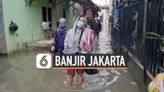 Sejumlah kawasan di Jakarta terendam banjir setelah diguyur hujan deras sejak hari Kamis. Sejumlah warga yang harus pergi bekerja terpaksa terobos genangan banjir hari Jumat (19/2) pagi.