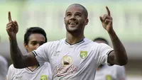 Ekspresi pemain Persebaya Surabaya, David da Silva, setelah membobol gawang Bhayangkara FC pada laga Liga 1 2019 di Stadion Patriot, Bekasi, Sabtu (31/8/2019). (Bola.com/Yoppy Renato)