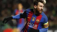 Selebrasi Striker Barcelona Lionel Messi saat mencetak gol ke gawang Glasgow Celtic (Reuters / Russell Cheyne)