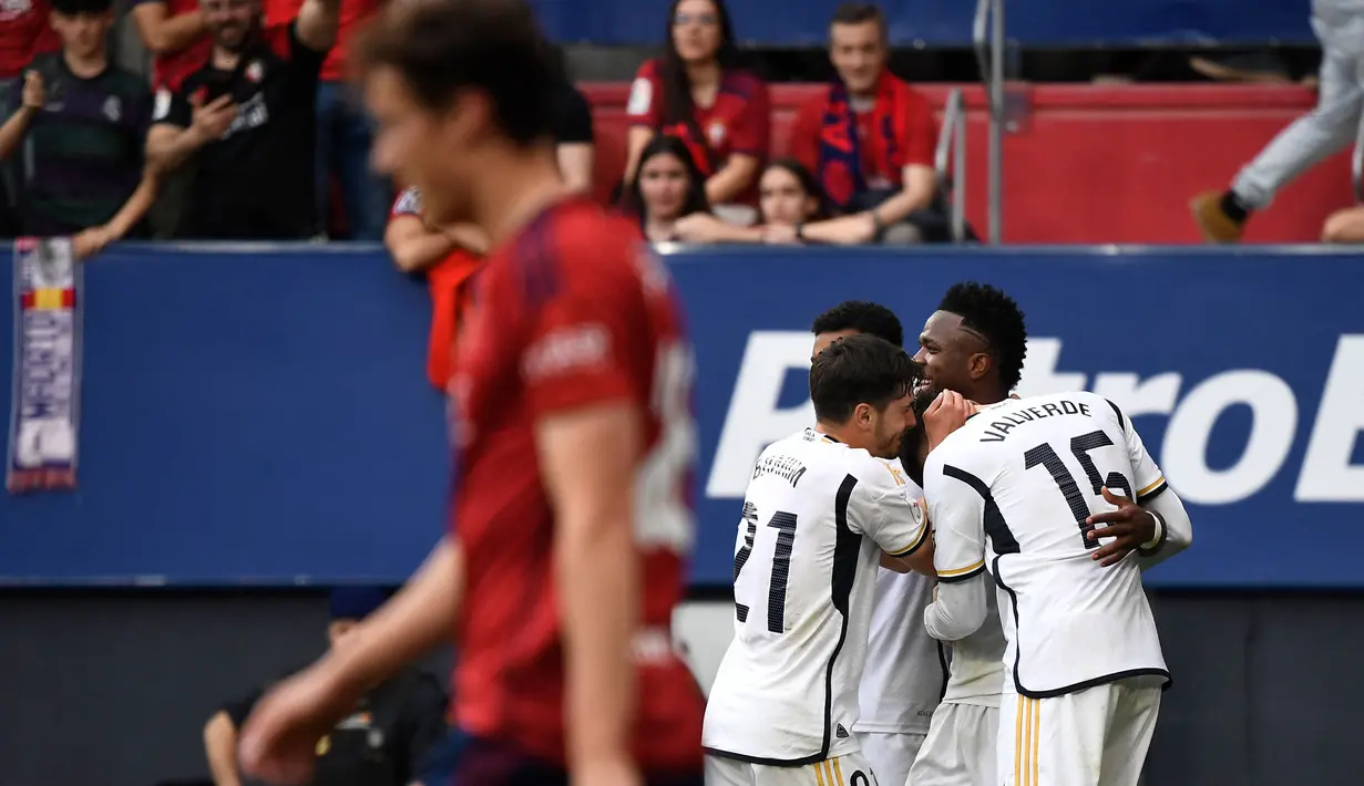 Kemenangan atas Osasuna kian mengokohkan posisi Real Madrid di puncak klasemen sementara Liga Spanyol dengan raihan 72 poin dari 29 pertandingan. (Ander Gillenea/AFP)