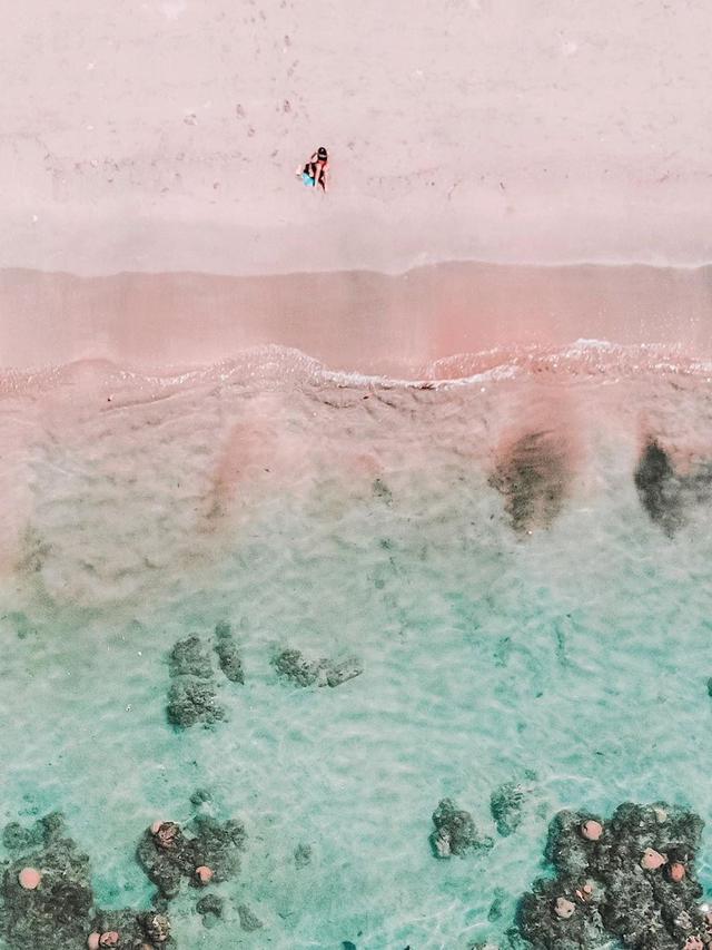 Andien liburan bareng suami dan anak. (Foto: Instagram @andienaisyah)