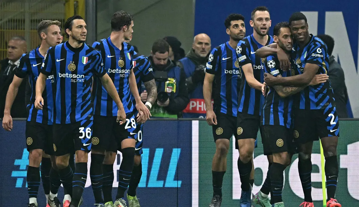 Inter Milan sukses menundukkan Arsenal dengan skor 1-0. (Gabriel BOUYS/AFP)