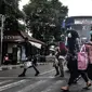 Penumpang bus antarkota antarprovinsi (AKAP) saat tiba di Terminal Kampung Rambutan, Jakarta, Minggu (3/1/2021). Sementara pemudik yang diberangkatkan menuju luar Jakarta melalui Terminal Kampung Rambutan sebanyak 15.059 penumpang. (merdeka.com/Iqbal S. Nugroho)