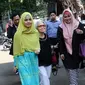 Risty Tagor bersama pengacaranya, Ina Rachman, mendatangi Komisi Perlindungan Anak Indonesia (KPAI) di Jakarta, Rabu (6/4/2016). [Foto: Herman Zakharia/Liputan6.com]